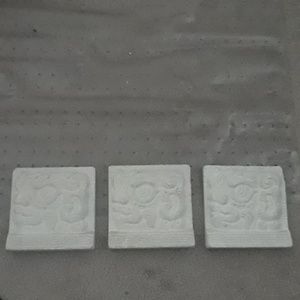 3 pieces of stone wall art (Cancun, Mexico)